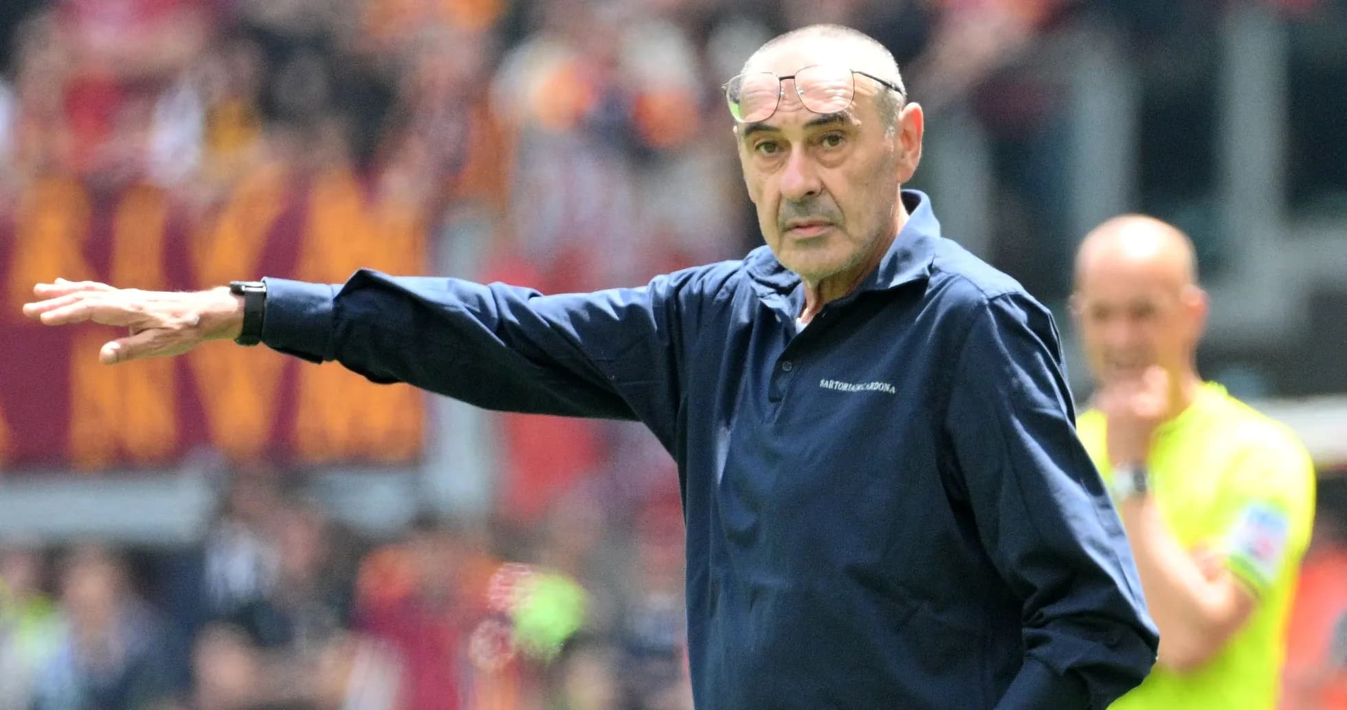 Manager gesturing during a football match