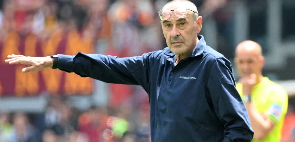 Manager gesturing during a football match