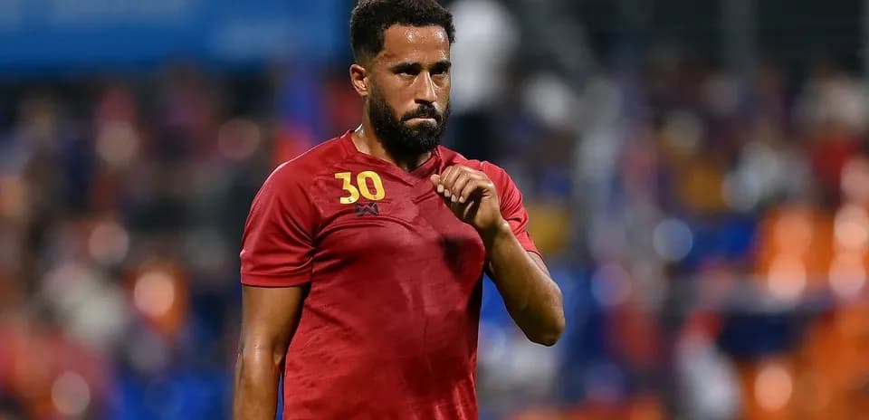 Player in red jersey during a match