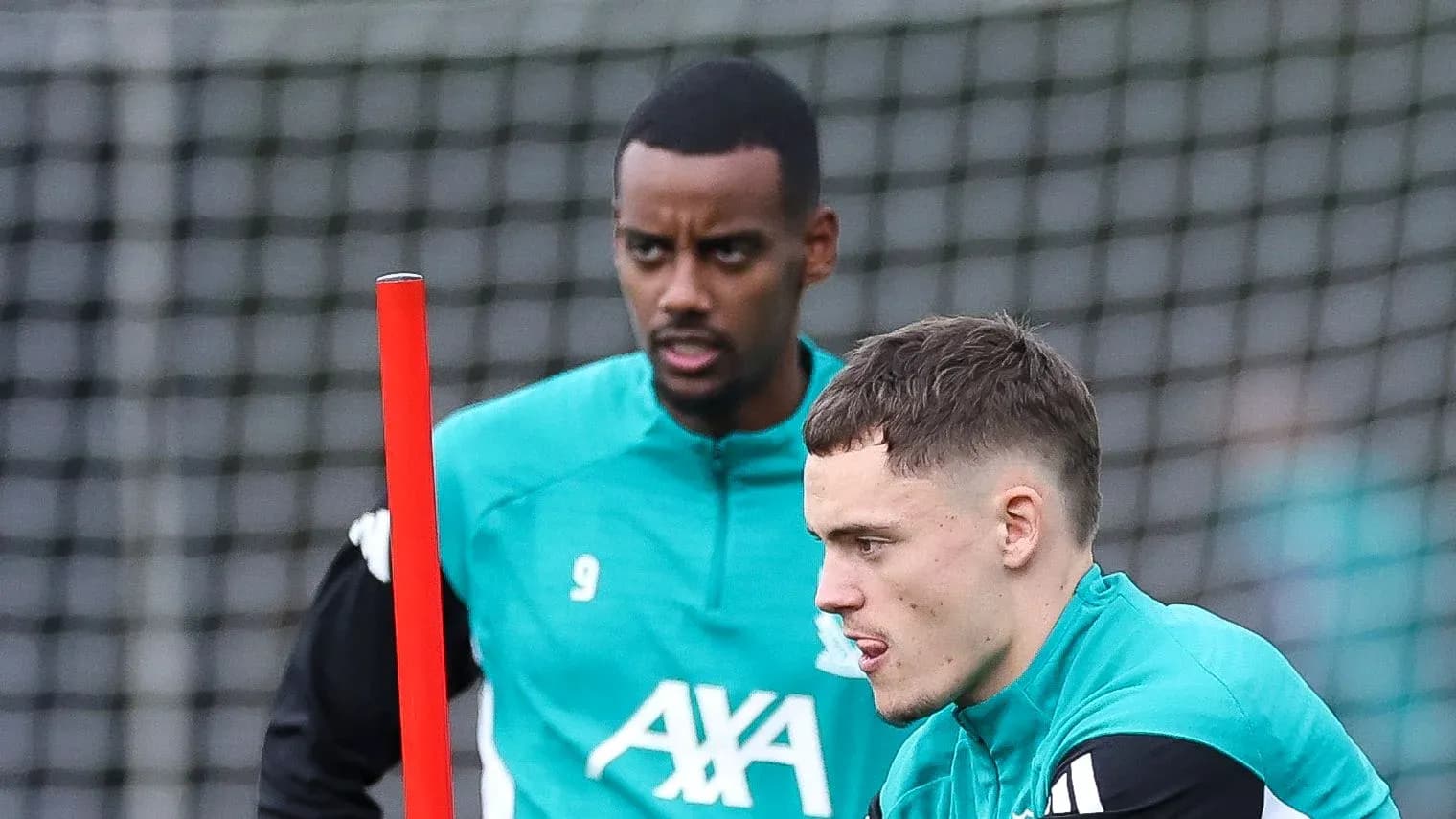 Two players in training session with equipment