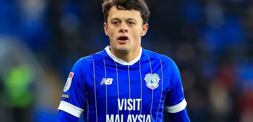 Player wearing blue jersey during football match