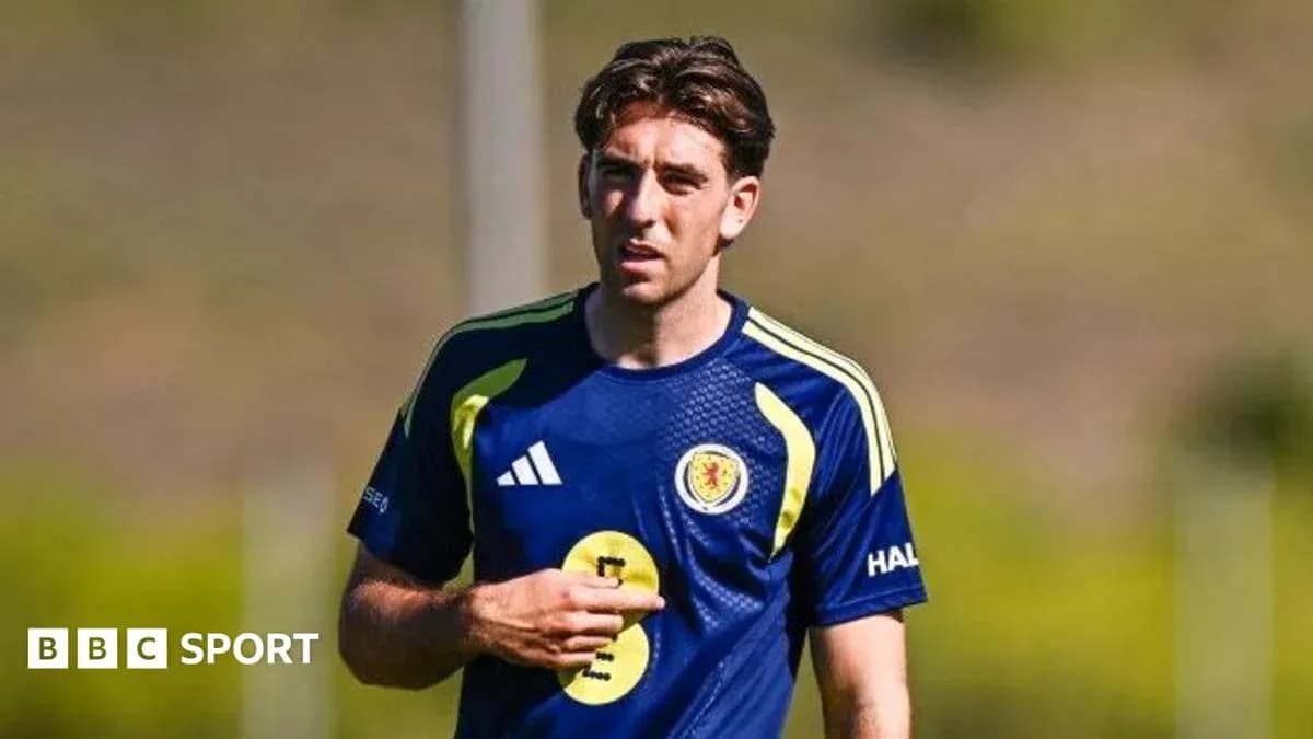 Player wearing Scotland training kit on pitch
