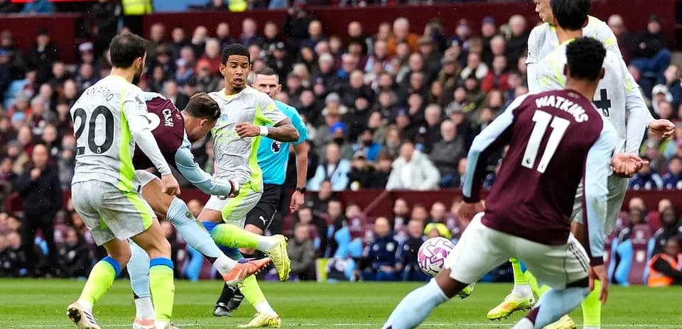 Players contesting the ball during Premier League match