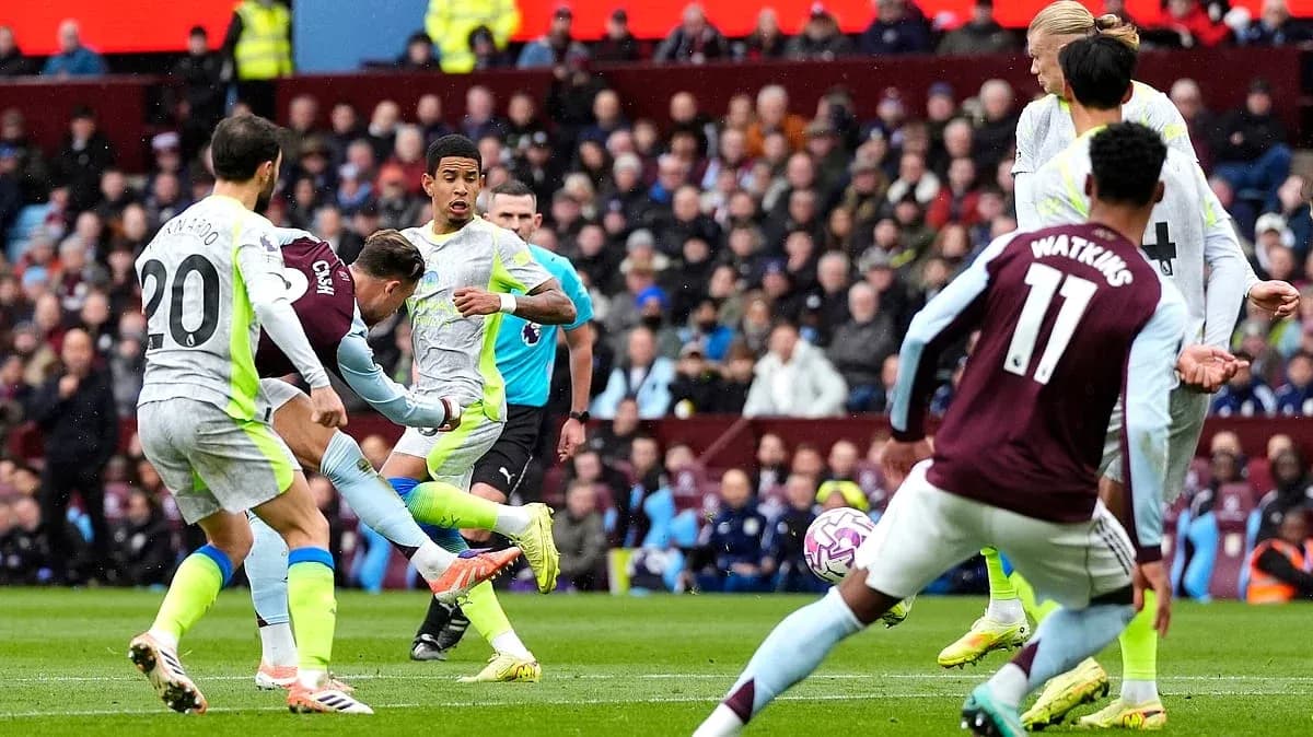 Players contesting the ball during Premier League match