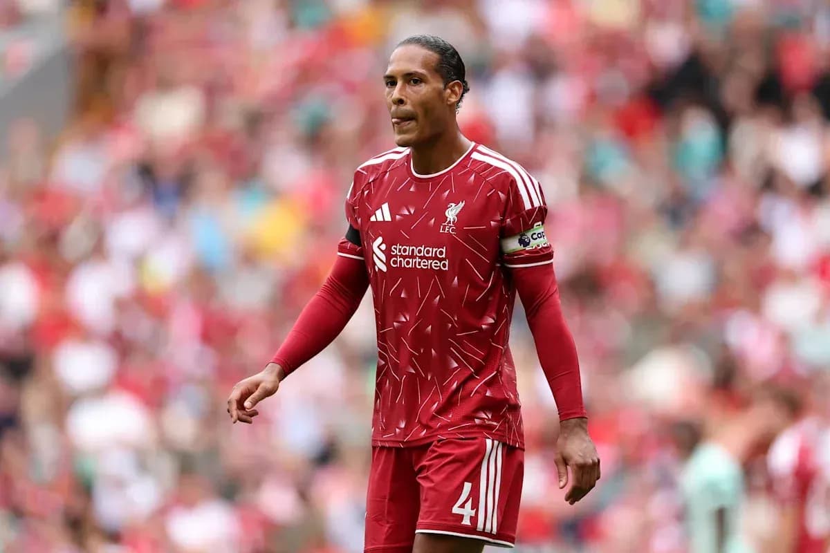 Liverpool player wearing red kit during match