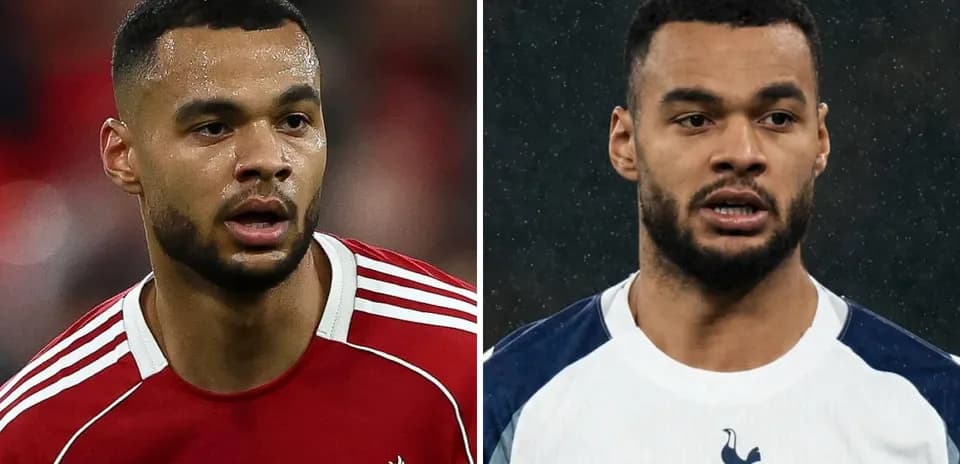 Two football players in team kits side by side