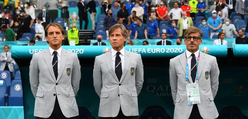Coaching staff in suits during UEFA Euro 2020