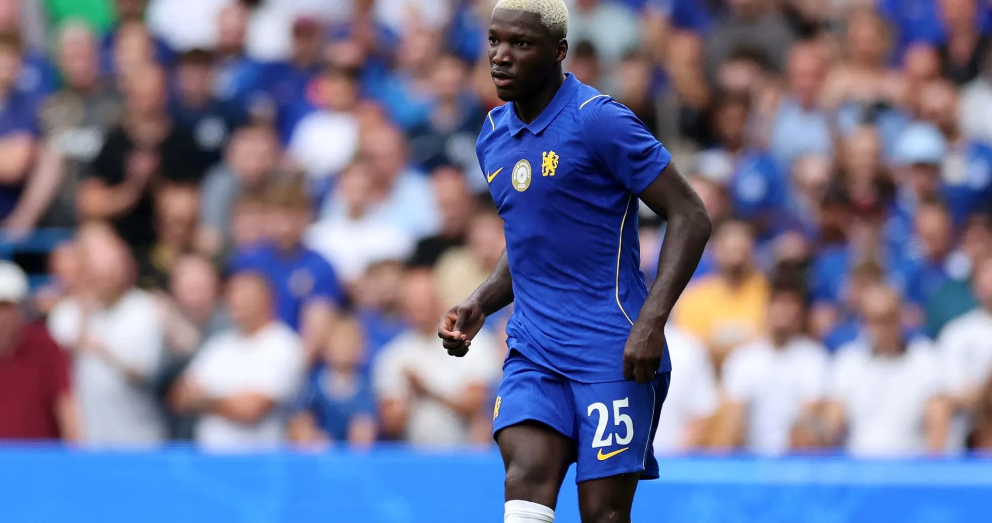 Player wearing Chelsea kit during match