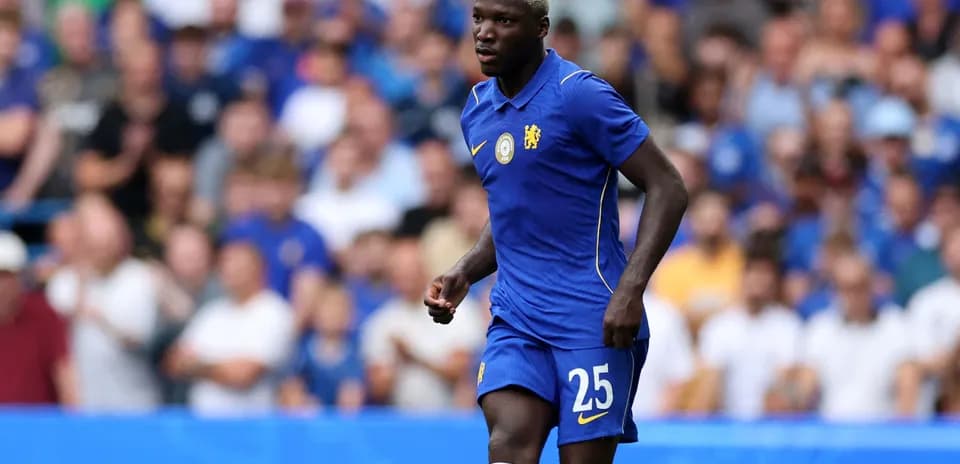 Player wearing Chelsea kit during match