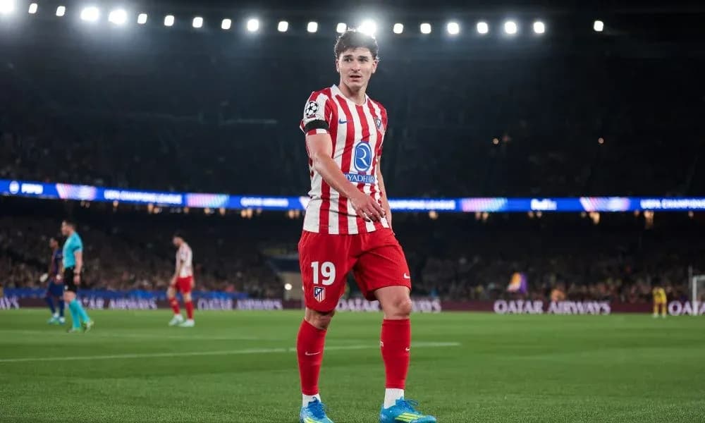 Atletico Madrid player on pitch during match