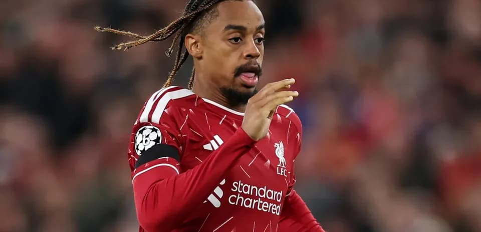 Liverpool player running on the pitch during match