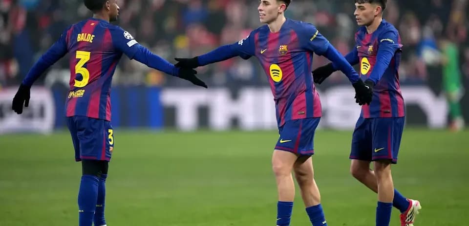 Barcelona players celebrating on the pitch