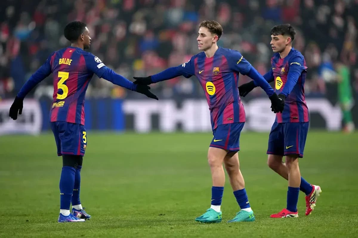 Barcelona players celebrating on the pitch