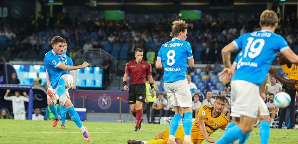 Napoli player striking the ball during match