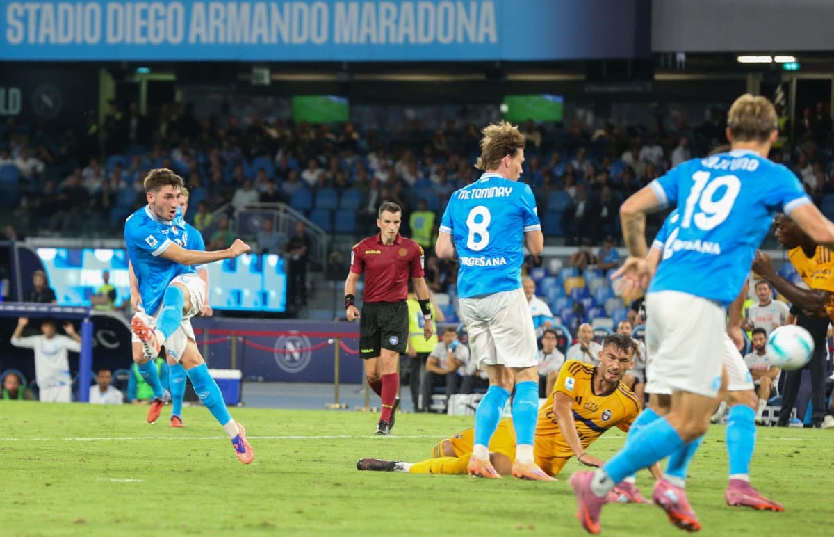 Napoli player striking the ball during match