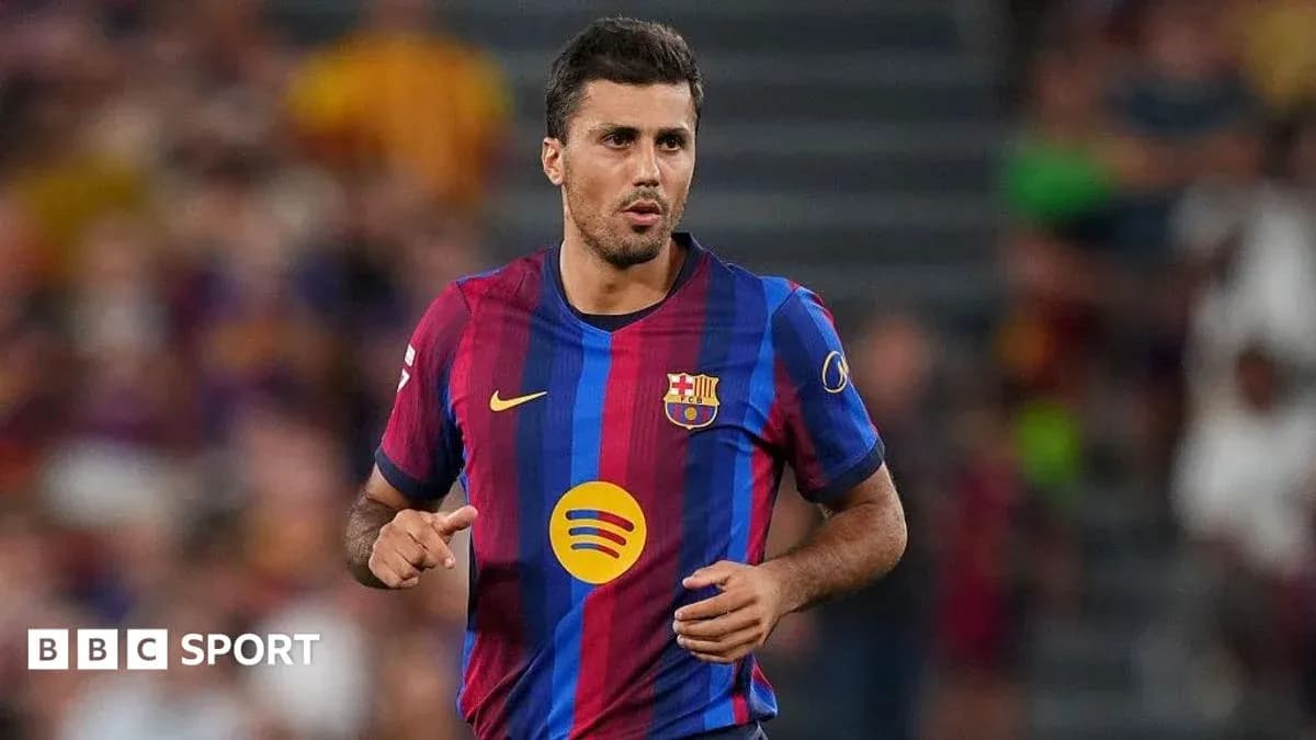 Player running on the pitch wearing FC Barcelona jersey