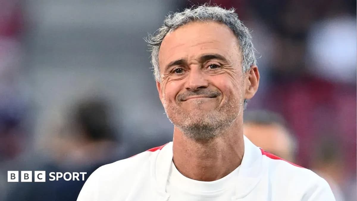 Coach smiling during match warm-up session