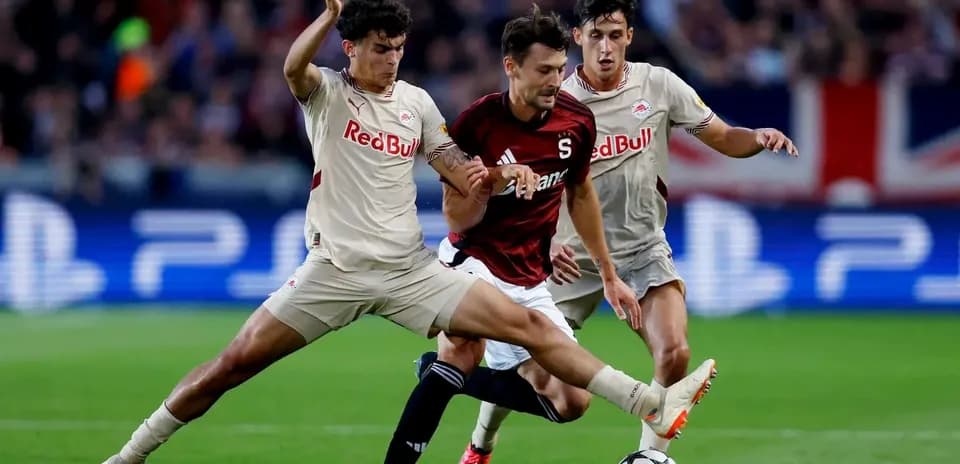 Players battling for the ball during match