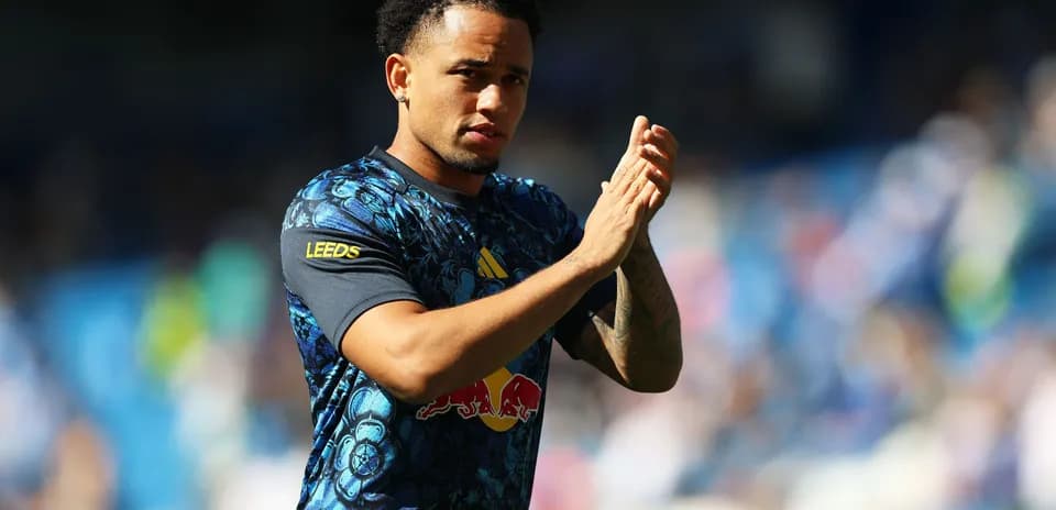Player applauding fans during warm-up session