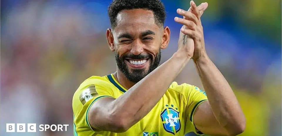 Player in Brazil jersey celebrating with applause