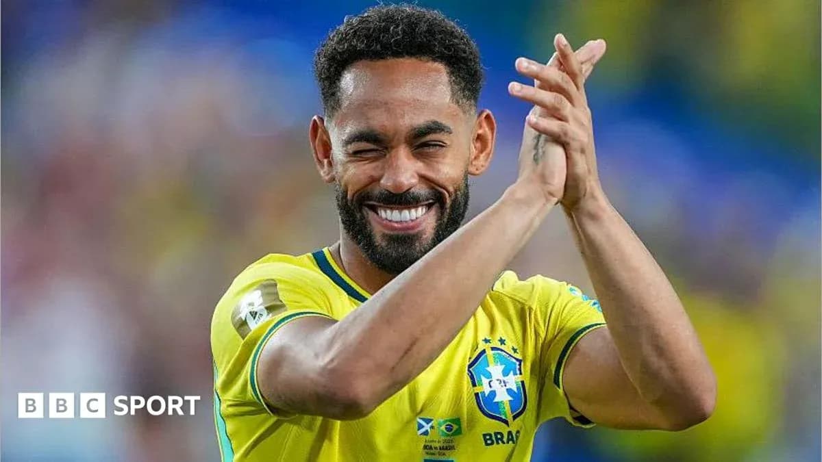 Player in Brazil jersey celebrating with applause