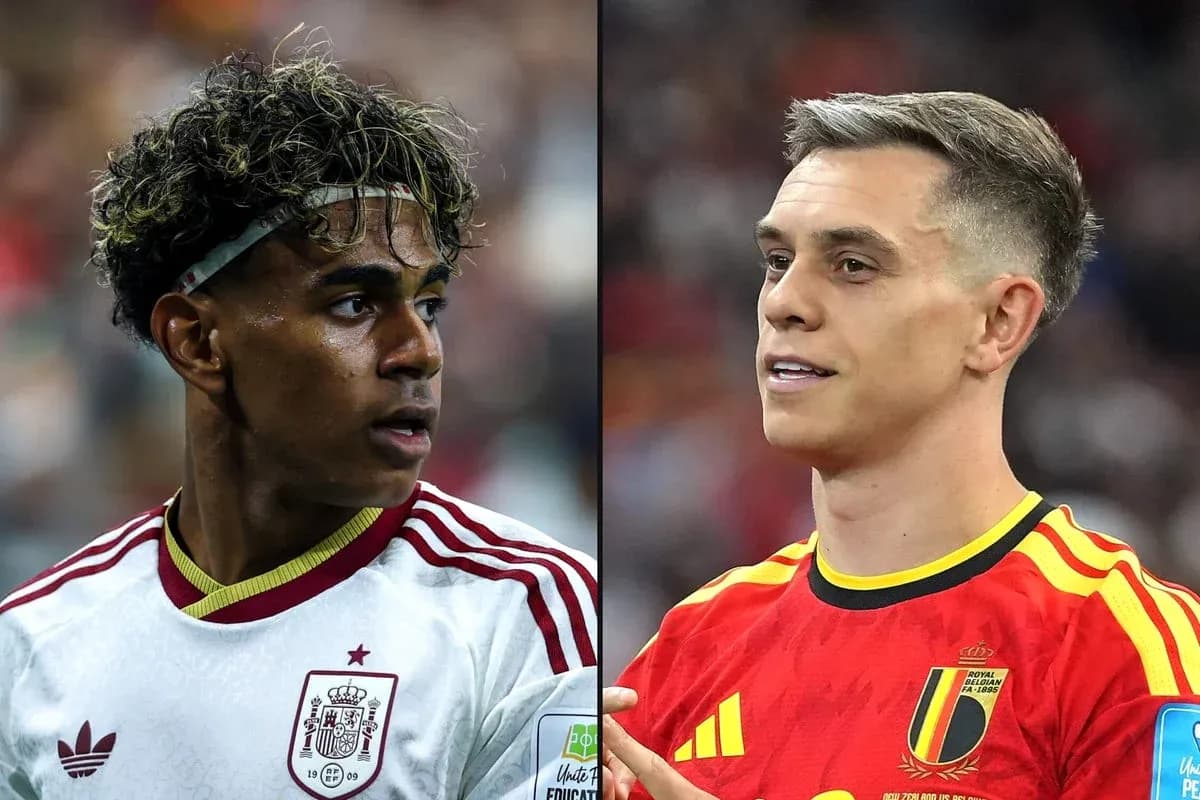 Two soccer players from Spain and Belgium facing each other