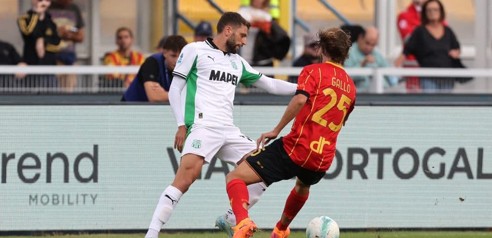 Sassuolo player challenges Lecce opponent during match