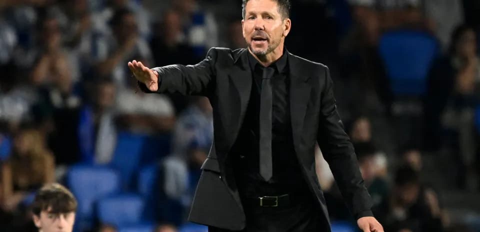 Coach giving instructions during a match