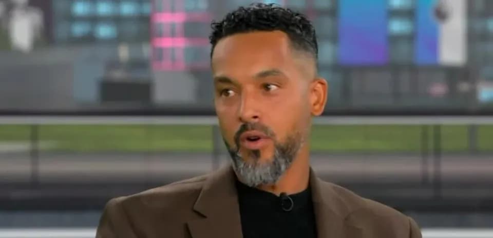 Man speaking during a sports discussion on set