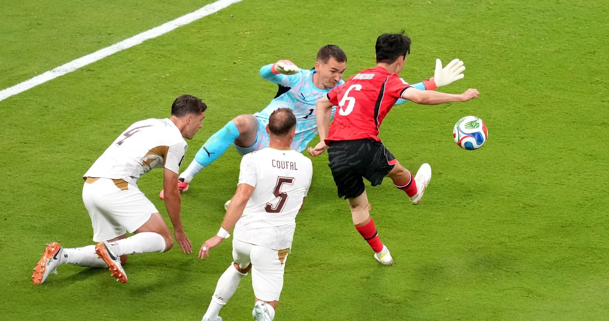 South Korea player attempting to score against Czech Republic