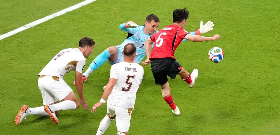 South Korea player attempting to score against Czech Republic