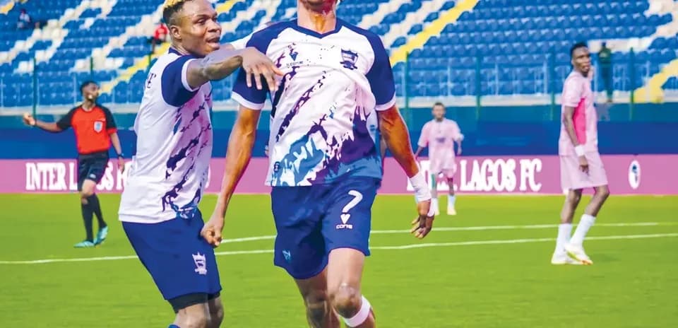 Players celebrating a goal during Enyimba match