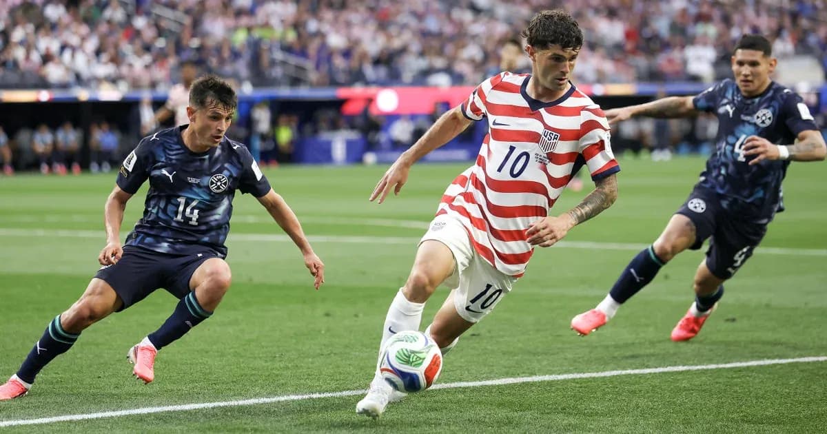 Player dribbling the ball during soccer match
