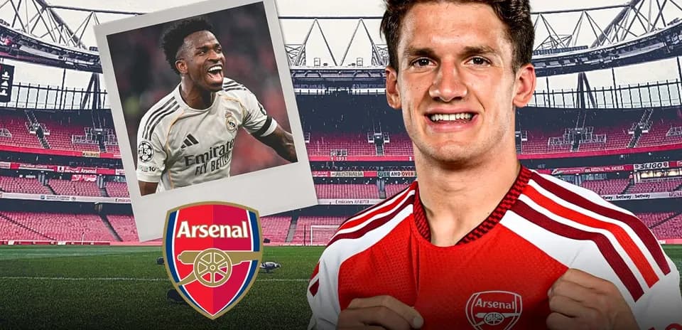 Arsenal player smiling in home jersey at stadium