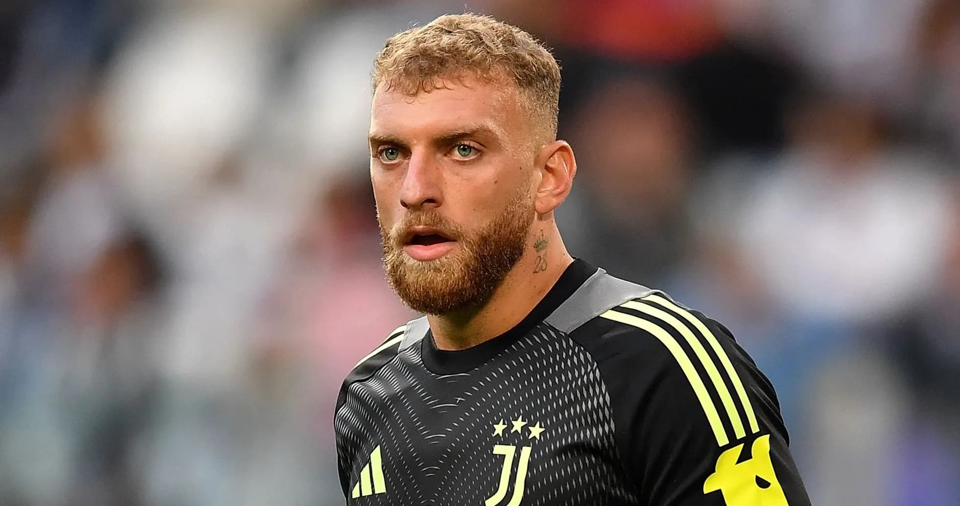 Goalkeeper in Juventus kit during match warm-up