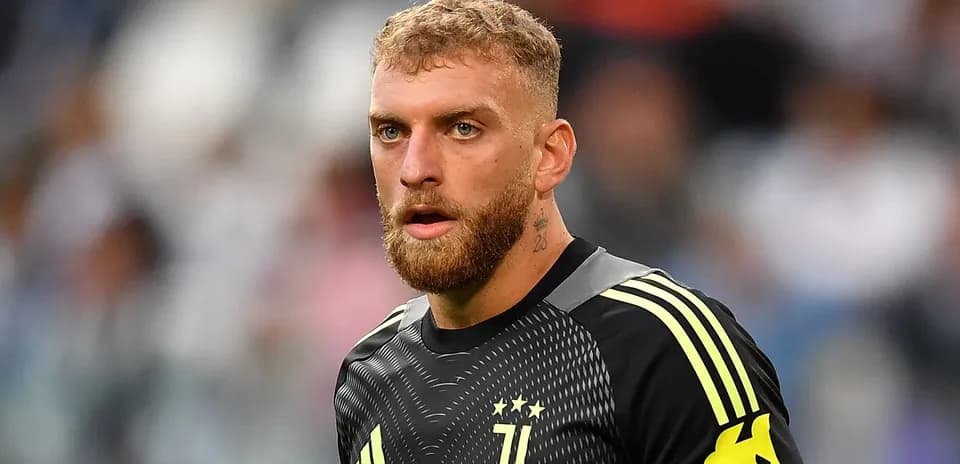 Goalkeeper in Juventus kit during match warm-up
