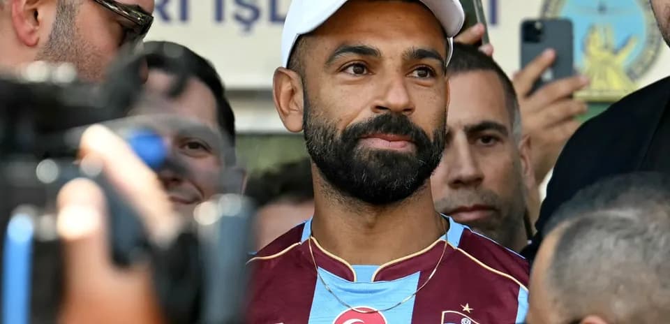 Football player in Trabzonspor jersey during event