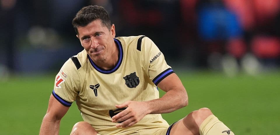Player sitting on field after play during match