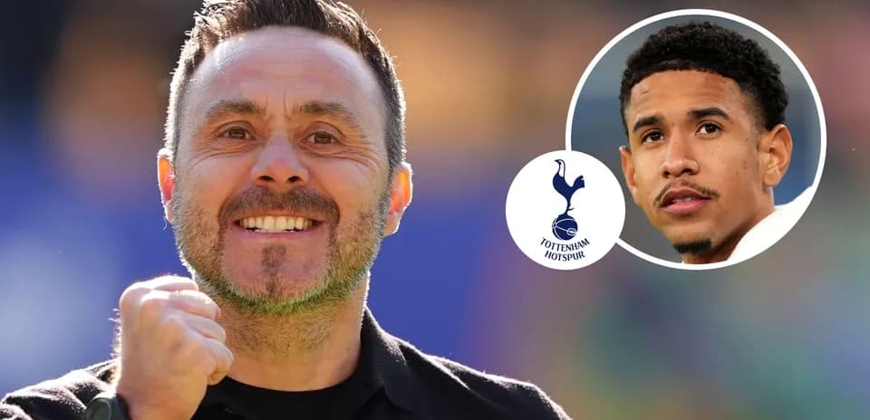 Coach celebrating with Tottenham Hotspur logo in background