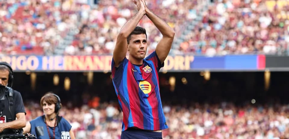 Player applauding fans during match at stadium
