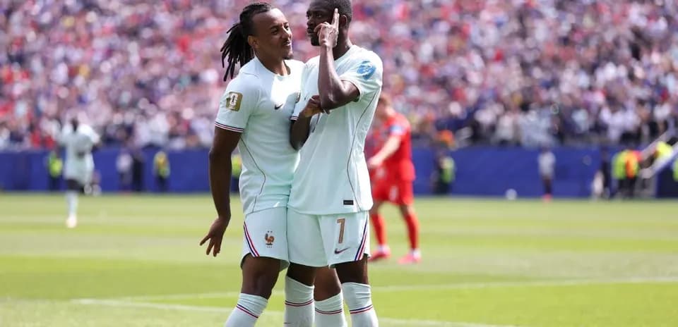 Two players celebrating a goal during match
