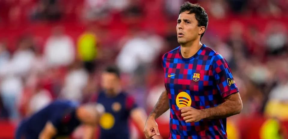 Player warming up in FC Barcelona kit before match