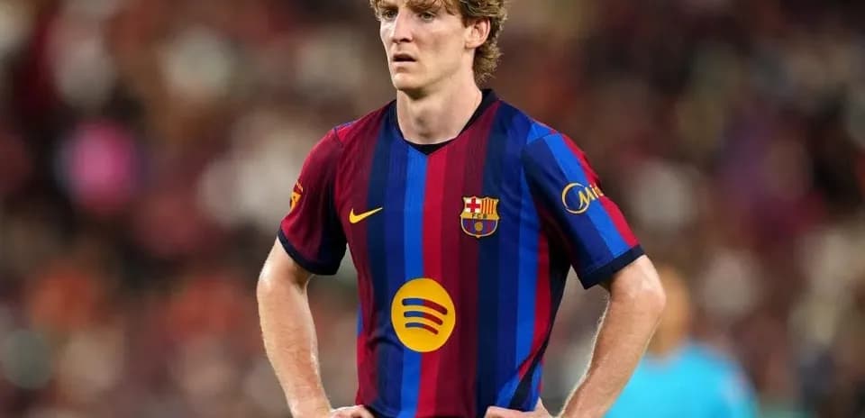 Barcelona player standing on the field during match