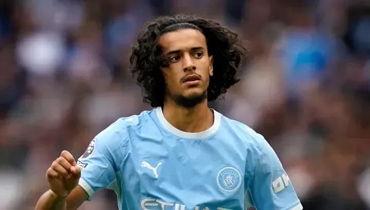 Player in light blue kit during match action