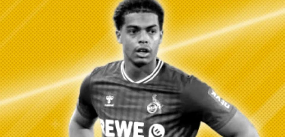 Player in REWE jersey with yellow background