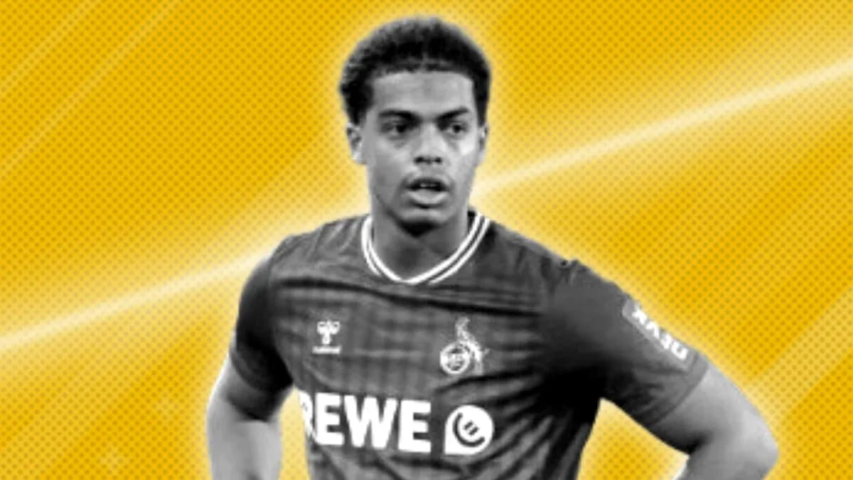 Player in REWE jersey with yellow background