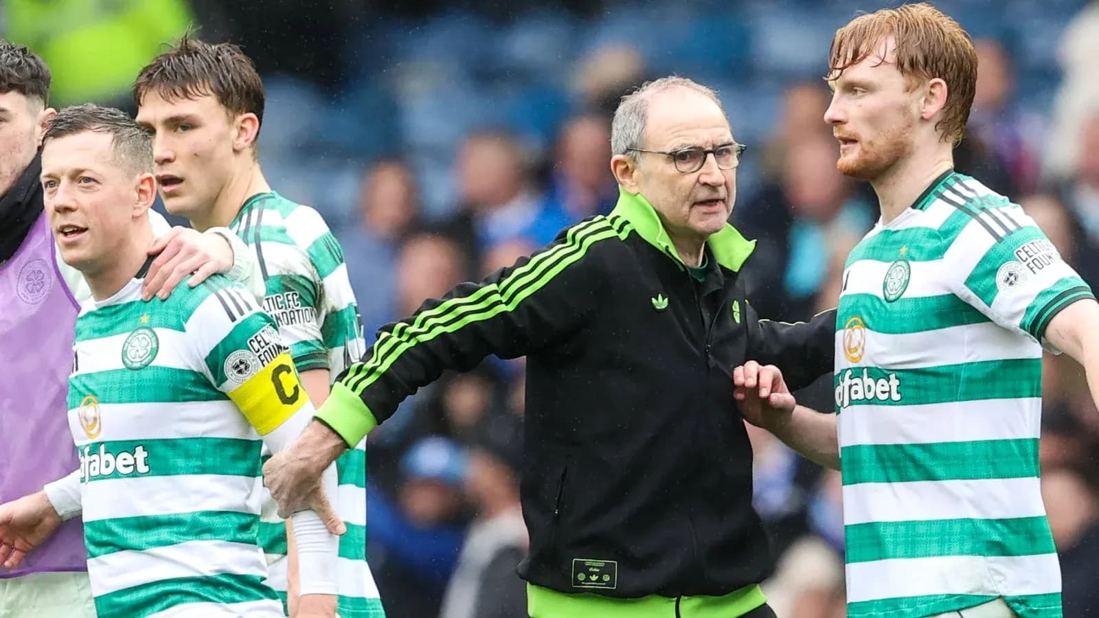Celtic players and manager discussing during match