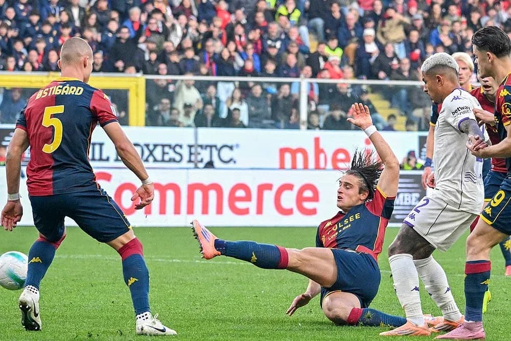 Player falling during Fiorentina vs Genoa match
