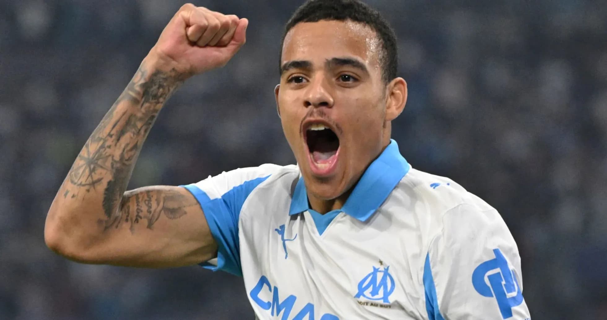 Player celebrating a goal for Marseille