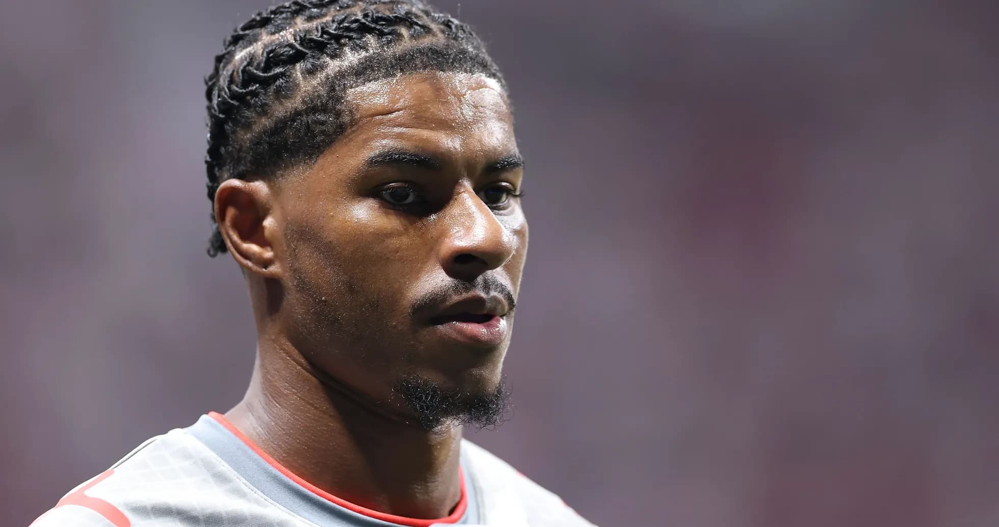 Athlete with braided hair in sports attire